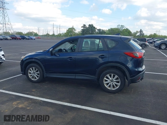 2016 Mazda CX-5 Sport with VIN JM3KE2BY3G0740488, listed as a IAAI auction lot 42000449 with 43,009 mi miles. Bid and sale history available at carsss.com. Image 14.