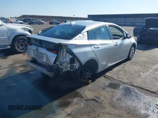2021 Toyota Prius L Eco with VIN JTDKAMFU7M3142616, listed as a IAAI auction lot 42755833 with 40,542 mi miles and . Bid and sale history available at DreamBid. Image 4.