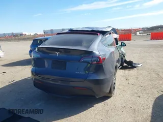 2022 Tesla Model Y Performance z VIN 7SAYGDEF8NF494753, wystawiony jako IAAI lot #41692464 z przebiegiem 14 616 mil mil oraz . Historia ofert i sprzedaży dostępna na DreamBid. Obrazek 4.