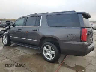2016 Chevrolet Suburban LT with VIN 1GNSCHKC1GR103107, listed as a Copart auction lot 82763174 with 71,265 mi miles and Clean Title. Bid and sale history available at carsss.com. Image 2.