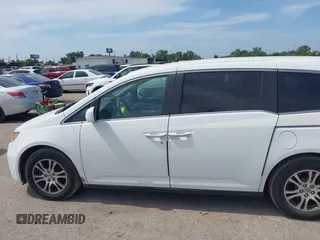 2013 Honda Odyssey EX z VIN 5FNRL5H44DB024764, wystawiony jako IAAI lot #42256598 z przebiegiem 169 708 mil mil oraz . Historia ofert i sprzedaży dostępna na DreamBid. Obrazek 14.