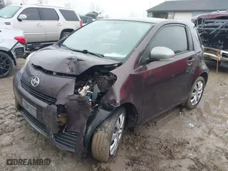 2012 Scion iQ with VIN JTNJJXB00CJ019651, listed as a IAAI auction lot 41667151 with 143997 miles. Bid and sale history available at carsss.com. Image 17.