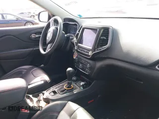 2021 Jeep Cherokee Trailhawk with VIN 1C4PJMBX4MD222987, listed as a IAAI auction lot 41771808 with 52,533 mi miles and . Bid and sale history available at DreamBid. Image 5.