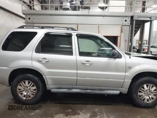 2007 Mercury Mariner Premier z VIN 4M2CU97197KJ06878, wystawiony jako IAAI lot #41033843 z przebiegiem 139 492 mil mil oraz . Historia ofert i sprzedaży dostępna na DreamBid. Obrazek 13.
