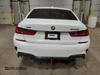 2020 BMW 3 Series M340i xDrive with VIN WBA5U9C06LA380967, listed as a Copart auction lot 68617303 with Not Provided miles and Salvage Title. Bid and sale history available at DreamBid. Image 6.