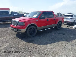 2005 Ford F-150 XLT with VIN 1FTPW12585KE04249, listed as a IAAI auction lot 41983950 with 212,289 mi miles. Bid and sale history available at carsss.com. Image 2.