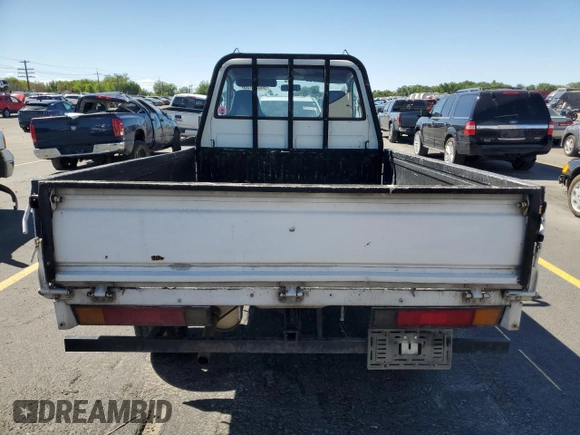 1994 Toyota Tacoma with VIN CM600012981, listed as a Copart auction lot 64052155 with 237,536 mi miles and Salvage title. Bid and sale history available at DreamBid. Image 6.