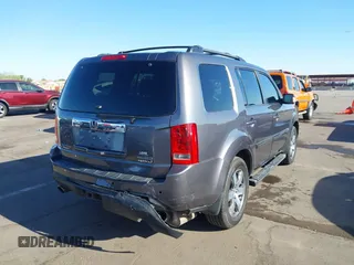 2014 Honda Pilot Touring z VIN 5FNYF4H90EB033259, wystawiony jako IAAI lot #42287774 z przebiegiem 115 416 mil mil oraz . Historia ofert i sprzedaży dostępna na DreamBid. Obrazek 6.