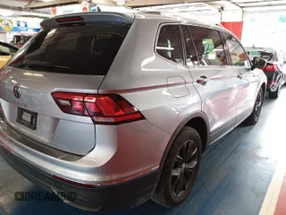 2024 Volkswagen Tiguan SE with VIN 3VV3B7AX8RM108454, listed as a IAAI auction lot 42793135 with 34,423 mi miles and . Bid and sale history available at DreamBid. Image 7.