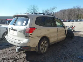 2017 Subaru Forester Premium with VIN JF2SJAGC8HH800622, listed as a IAAI auction lot 41704366 with 57,016 mi miles. Bid and sale history available at carsss.com. Image 4.