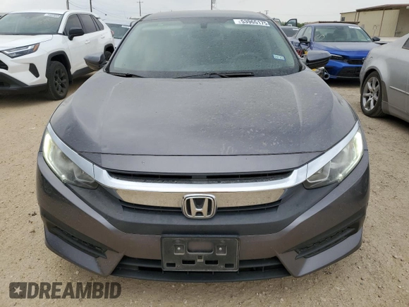 2017 Honda Civic LX z VIN 19XFC2F53HE043251, wystawiony jako Copart lot #53965175 z przebiegiem 91 156 mil mil oraz Czysty tytuł • Clean title. Historia ofert i sprzedaży dostępna na DreamBid. Obrazek 5.
