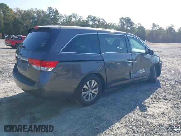 2016 Honda Odyssey EX-L with VIN 5FNRL5H65GB022236, listed as a IAAI auction lot 40761542 with 236,979 mi miles. Bid and sale history available at carsss.com. Image 4.
