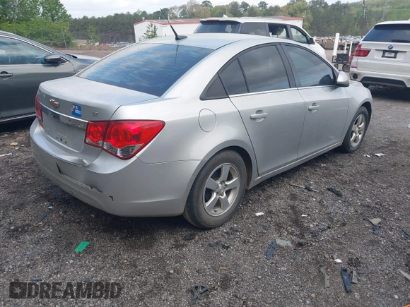 2014 Chevrolet Cruze 1LT with VIN 1G1PC5SB5E7403383, listed as a IAAI auction lot 41960344 with 141,586 mi miles and . Bid and sale history available at DreamBid. Image 4.