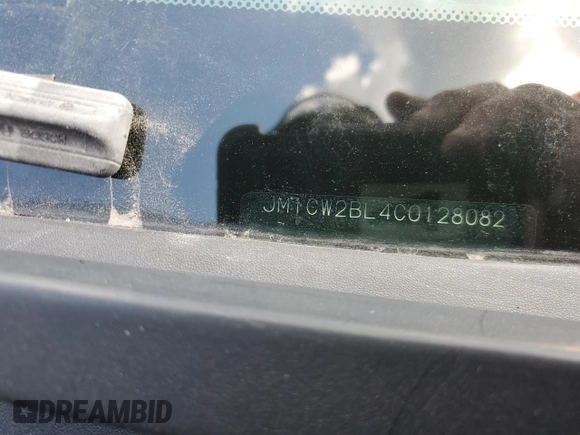 2012 Mazda 5 Sport with VIN JM1CW2BL4C0128082, listed as a Copart auction lot 67080914 with Not Provided miles and Salvage Title. Bid and sale history available at DreamBid. Image 13.