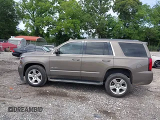 2015 Chevrolet Tahoe LT with VIN 1GNSCBKC5FR585138, listed as a IAAI auction lot 42420496 with 177,104 mi miles and . Bid and sale history available at DreamBid. Image 14.