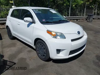 2009 Scion xD with VIN JTKKU10429J046662, listed as a IAAI auction lot 42147835 with 182,952 mi miles. Bid and sale history available at carsss.com. Image 1.