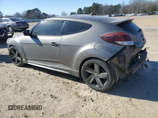 2015 Hyundai Veloster Turbo with VIN KMHTC6AEXFU249159, listed as a Copart auction lot 42161855 with 137,747 mi miles and Salvage title. Bid and sale history available at DreamBid. Image 2.