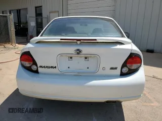 2000 Nissan Maxima GXE z VIN JN1CA31D3YT537410, wystawiony jako Copart lot #68046964 z przebiegiem 313 180 mil mil oraz Czysty tytuł • Clean title. Historia ofert i sprzedaży dostępna na DreamBid. Obrazek 6.