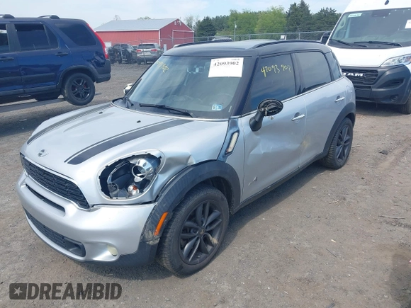 2012 MINI Countryman S with VIN WMWZC5C56CWM13283, listed as a IAAI auction lot 42093902 with 230,000 mi miles and . Bid and sale history available at DreamBid. Image 2.