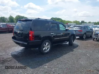 2009 Chevrolet Tahoe LTZ z VIN 1GNFK33059R297641, wystawiony jako IAAI lot #42099230 z przebiegiem 226 402 mil mil oraz . Historia ofert i sprzedaży dostępna na DreamBid. Obrazek 4.