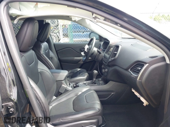 2019 Jeep Cherokee Latitude Plus with VIN 1C4PJMLB5KD489488, listed as a IAAI auction lot 42147598 with 33,002 mi miles and . Bid and sale history available at carsss.com. Image 5.