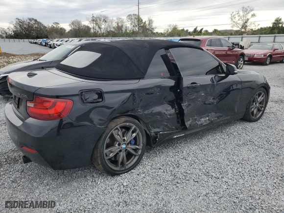 2015 BMW 2 Series M235i with VIN WBA1M1C54FV393578, listed as a Copart auction lot 88945735 with 95,713 mi miles and Salvage Title. Bid and sale history available at carsss.com. Image 3.