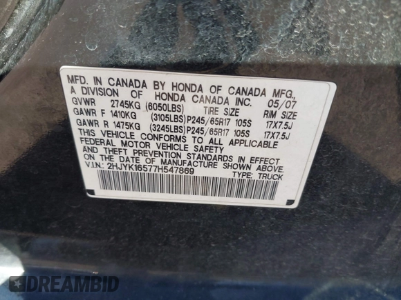 2007 Honda Ridgeline RTL w/Leather with VIN 2HJYK16577H547869, listed as a IAAI auction lot 41939741 with 248,916 mi miles. Bid and sale history available at carsss.com. Image 9.
