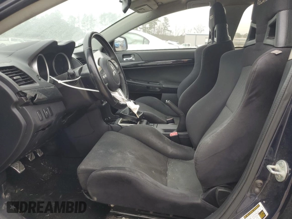 2014 Mitsubishi Lancer Evolution GSR with VIN JA32W8FV5EU017755, listed as a Copart auction lot 47308485 with 143,912 mi miles and Clean Title. Bid and sale history available at carsss.com. Image 7.