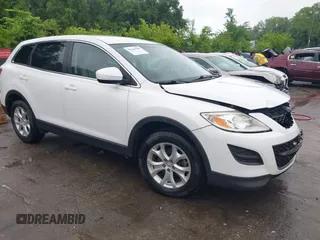 2012 Mazda CX-9 Touring z VIN JM3TB2CA8C0356215, wystawiony jako IAAI lot #42344500 z przebiegiem 195 907 mil mil oraz . Historia ofert i sprzedaży dostępna na DreamBid. Obrazek 1.