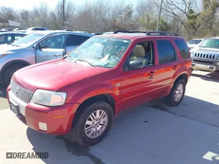 2006 Mercury Mariner Luxury with VIN 4M2YU56136KJ18068, listed as a IAAI auction lot 41776410 with 170,619 mi miles. Bid and sale history available at carsss.com. Image 2.