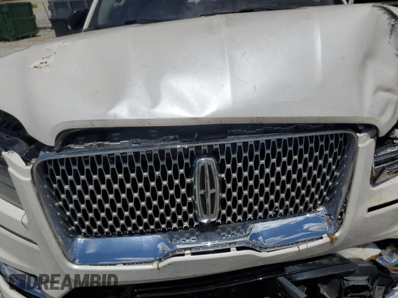 2019 Lincoln Navigator Reserve z VIN 5LMJJ2LT9KEL19544, wystawiony jako Copart lot #52240315 z przebiegiem 74 144 mil mil oraz Szkoda całkowita • Salvage title. Historia ofert i sprzedaży dostępna na DreamBid. Obrazek 12.
