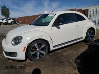 2012 Volkswagen Beetle 2.0T Turbo w/Sun/Snd/Nav PZEV with VIN 3VWVA7AT4CM654695, listed as a Copart auction lot 52117685 with 107,203 mi miles and Clean Title. Bid and sale history available at carsss.com. Image 1.