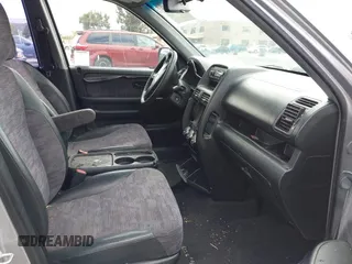 2002 Honda CR-V LX with VIN JHLRD68422C008983, listed as a IAAI auction lot 42112835 with 198,114 mi miles and . Bid and sale history available at carsss.com. Image 5.