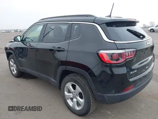2018 Jeep Compass Altitude with VIN 3C4NJDBB9JT202297, listed as a IAAI auction lot 42020996 with 59,461 mi miles and . Bid and sale history available at DreamBid. Image 3.