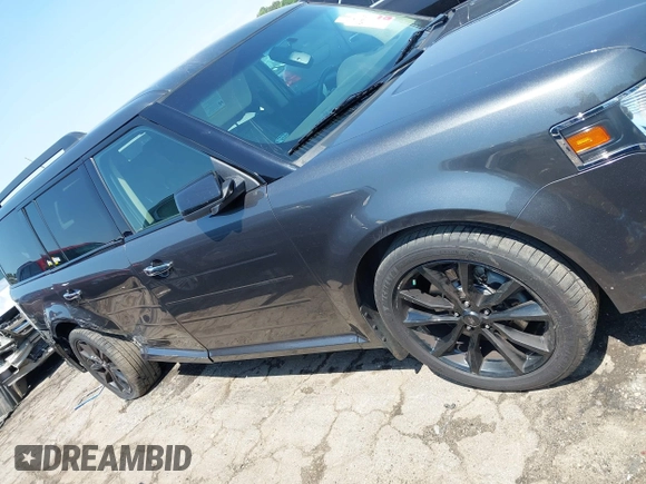 2016 Ford Flex SEL z VIN 2FMGK5C8XGBA08263, wystawiony jako IAAI lot #42066159 z przebiegiem 111 909 mil mil oraz . Historia ofert i sprzedaży dostępna na DreamBid. Obrazek 13.