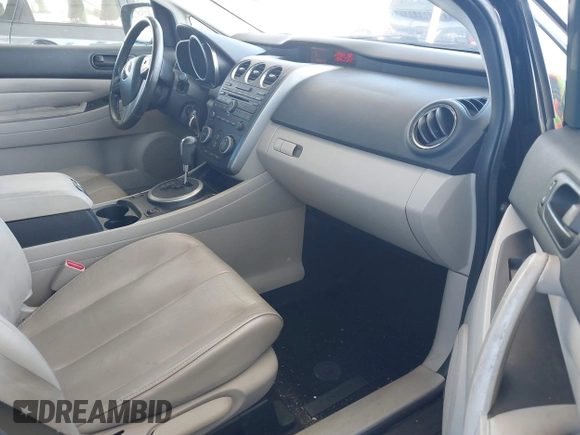 2012 Mazda CX-7 i Touring z VIN JM3ER2CMXC0421774, wystawiony jako IAAI lot #41743231 z przebiegiem 132 488 mil mil oraz . Historia ofert i sprzedaży dostępna na DreamBid. Obrazek 5.
