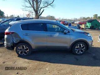 2021 Kia Sportage EX with VIN KNDPNCAC8M7854533, listed as a IAAI auction lot 41757662 with 25,051 mi miles and . Bid and sale history available at DreamBid. Image 13.