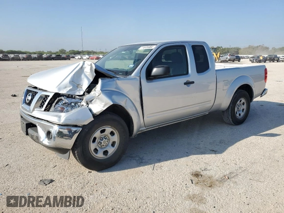 2010 Nissan Frontier XE with VIN 1N6BD0CT1AC427994, listed as a Copart auction lot 71574484 with 121,102 mi miles and Salvage title. Bid and sale history available at DreamBid. Image 1.