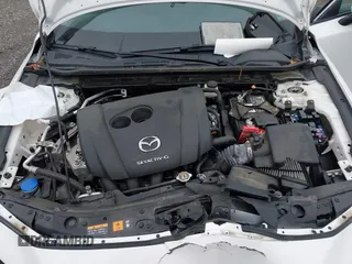 2021 Mazda 3 Preferred z VIN 3MZBPBCL0MM250862, wystawiony jako IAAI lot #42318612 z przebiegiem 86 056 mil mil oraz . Historia ofert i sprzedaży dostępna na DreamBid. Obrazek 10.