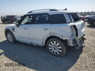 2020 MINI Countryman Cooper S with VIN WMZYW7C01L3L86999, listed as a Copart auction lot 60845345 with 74,438 mi miles and Salvage title. Bid and sale history available at DreamBid. Image 2.