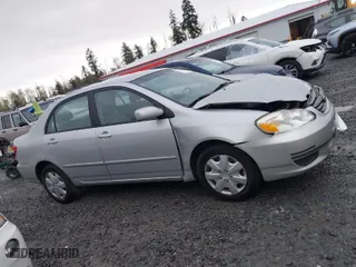 2004 Toyota Corolla CE with VIN 1NXBR32E74Z336134, listed as a IAAI auction lot 41966813 with 257,177 mi miles. Bid and sale history available at carsss.com. Image 13.