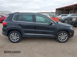 2016 Volkswagen Tiguan S with VIN WVGBV7AX9GW566451, listed as a IAAI auction lot 41393999 with 51,616 mi miles and . Bid and sale history available at DreamBid. Image 14.