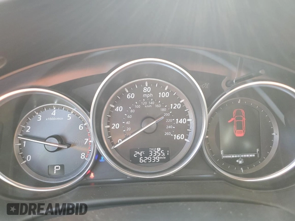 2014 Mazda CX-5 Grand Touring with VIN JM3KE4DY2E0354795, listed as a Copart auction lot 54205775 with 62,939 mi miles and Salvage Title. Bid and sale history available at DreamBid. Image 9.