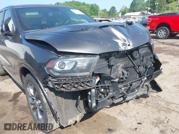 2019 Dodge Durango R/T with VIN 1C4SDJCTXKC740858, listed as a IAAI auction lot 42380318 with 99,060 mi miles and . Bid and sale history available at DreamBid. Image 18.