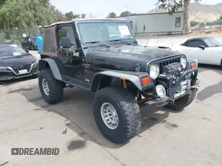 1998 Jeep Wrangler Sport z VIN 1J4FY19S1WP776998, wystawiony jako IAAI lot #42551603 z przebiegiem 143 031 mil mil oraz . Historia ofert i sprzedaży dostępna na DreamBid. Obrazek 1.