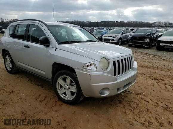 2007 Jeep Compass Sport with VIN 1J8FT47W87D211137, listed as a Copart auction lot 45294835 with 144,156 mi miles and Salvage Title. Bid and sale history available at carsss.com. Image 12.