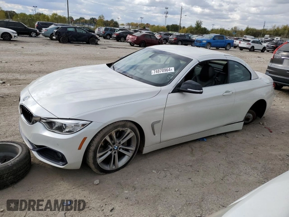 2015 BMW 4 Series 435i with VIN WBA3T3C56FP738508, listed as a Copart auction lot 74870964 with 77,111 mi miles and Salvage Title. Bid and sale history available at carsss.com. Image 1.