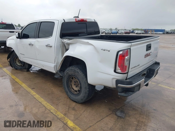 2018 GMC Canyon 4WD SLT with VIN 1GTP6DE18J1111056, listed as a IAAI auction lot 41903405 with 99,280 mi miles. Bid and sale history available at carsss.com. Image 3.
