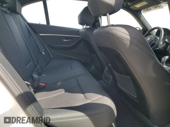 2018 BMW 3 Series 330i xDrive with VIN WBA8D9G56JNU71570, listed as a Copart auction lot 54071565 with 73,305 mi miles and Salvage title. Bid and sale history available at DreamBid. Image 10.
