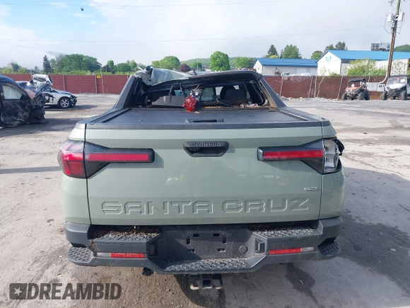 2022 Hyundai Santa Cruz SEL z VIN 5NTJCDAE8NH024149, wystawiony jako IAAI lot #42197663 z przebiegiem 51 491 mil mil oraz . Historia ofert i sprzedaży dostępna na DreamBid. Obrazek 16.